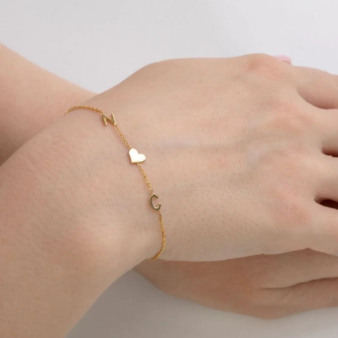 Personlig sideveis initialarmbånd