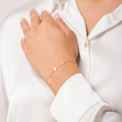 Personlig sideveis initialarmbånd